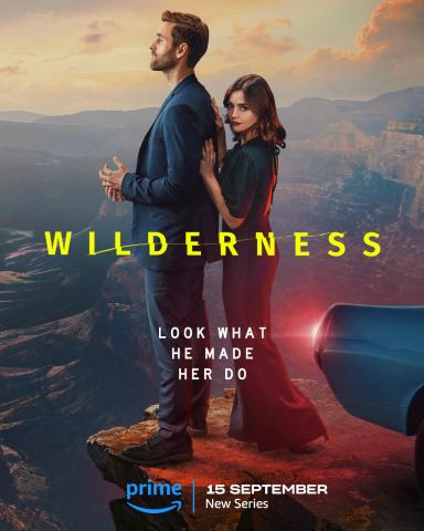 Wilderness Filmplakat mit Abgrund im Hintergrund, Hauptdarsteller aneinander geschmiegt, sie im roten Kleid, er im Jackett, sie scheint ihn schubsen zu wollen